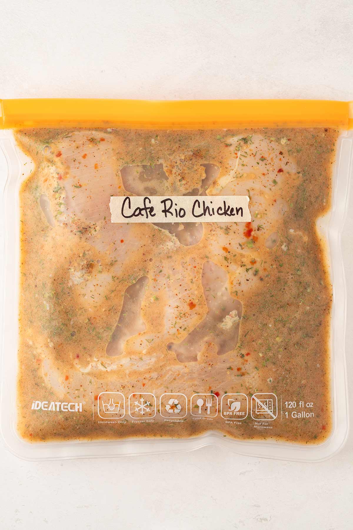 Copycat Cafe Rio Chicken prepared to go into the freezer.
