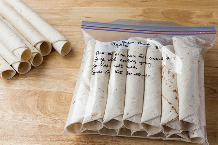 Chicken Bacon Ranch Taquitos packaged for the freezer in a ziptop freezer bag.