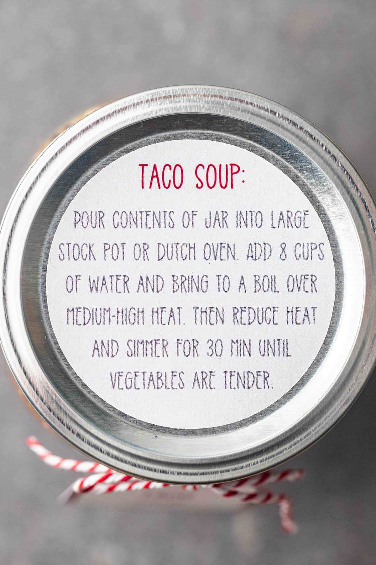 Closeup shots of the instruction label and optional gift tag for making Taco Soup in a Jar.