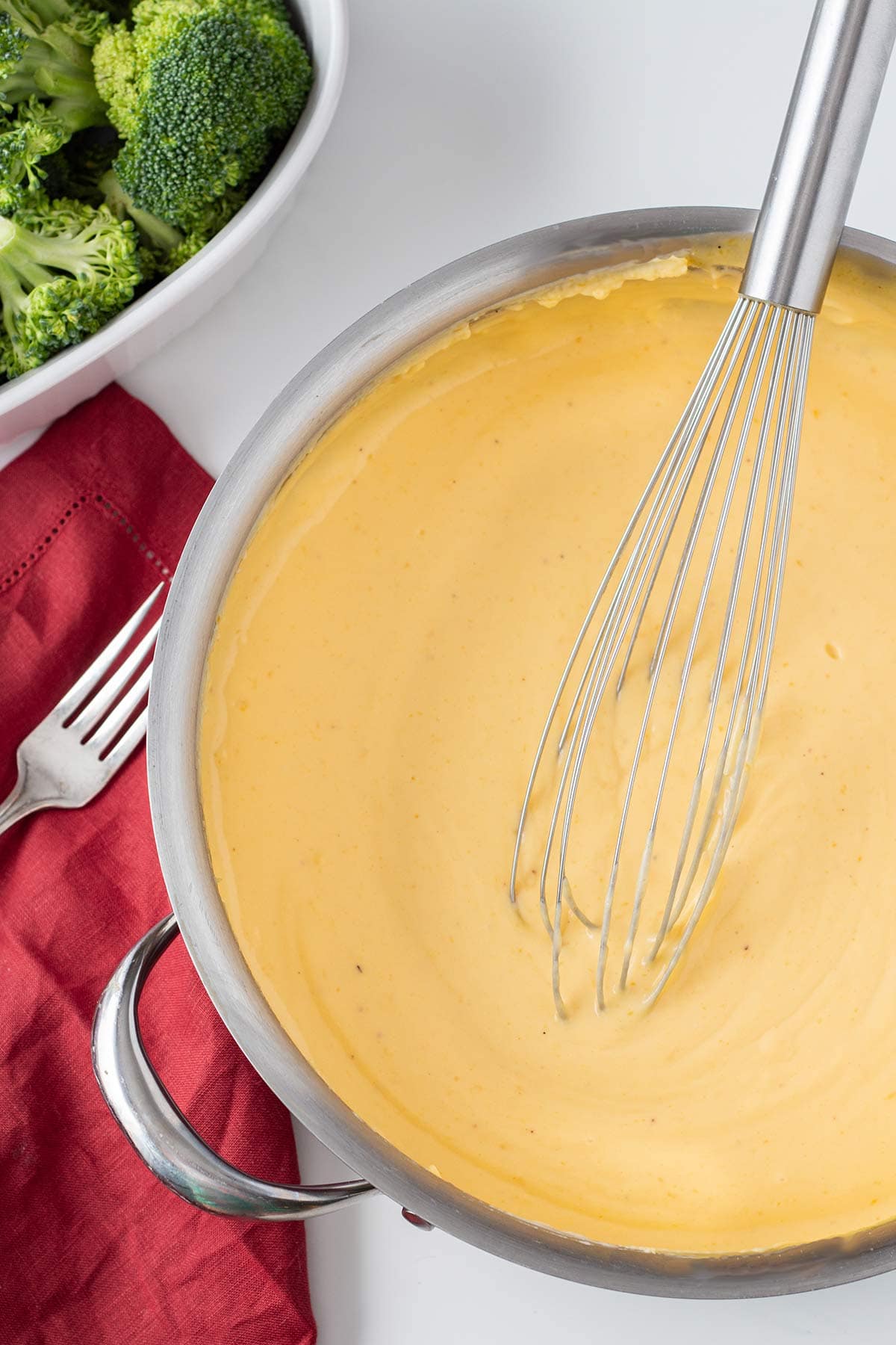 Overhead shot of freezer cheese sauce in a saucepan.