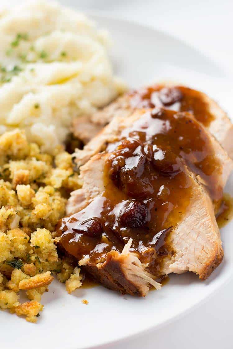 Close up shot of Spiced Cranberry Pork Roast on dinner plate