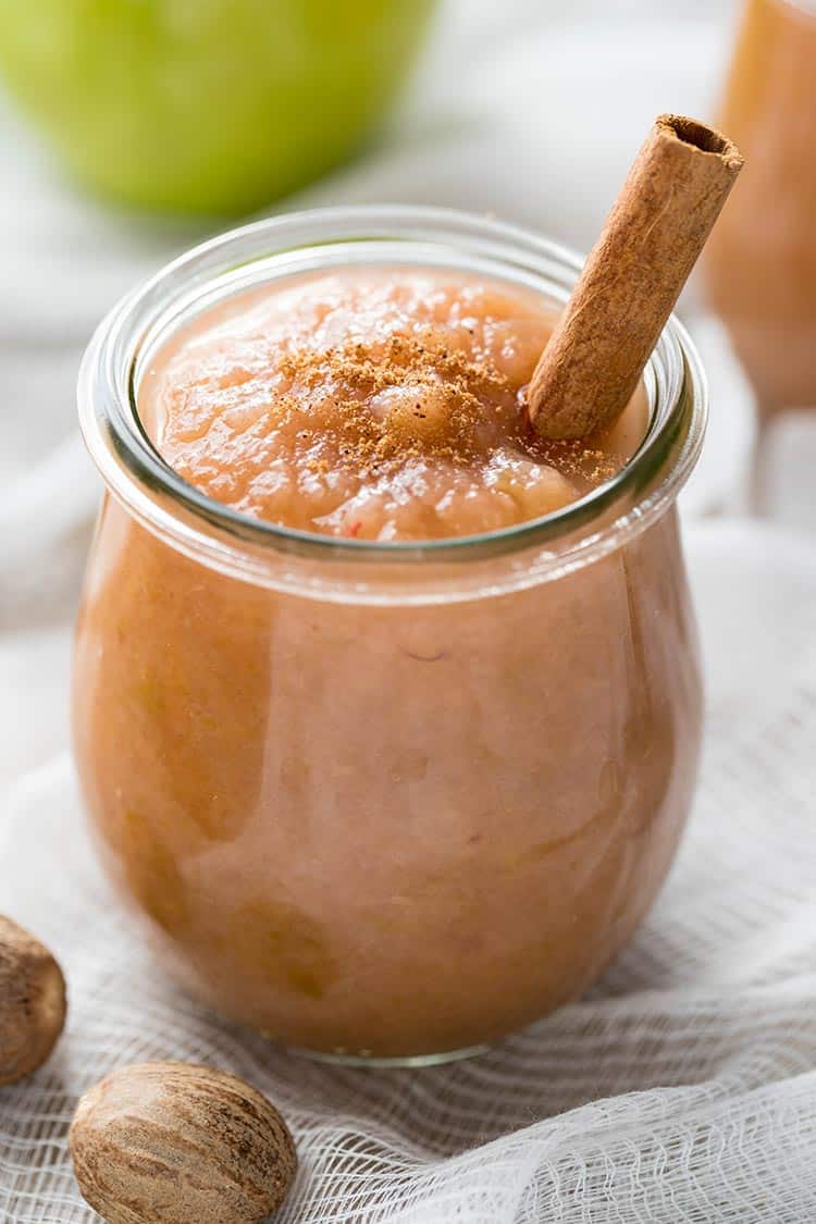 Easy Instant Pot Applesauce in a small jar with cinnamon stick
