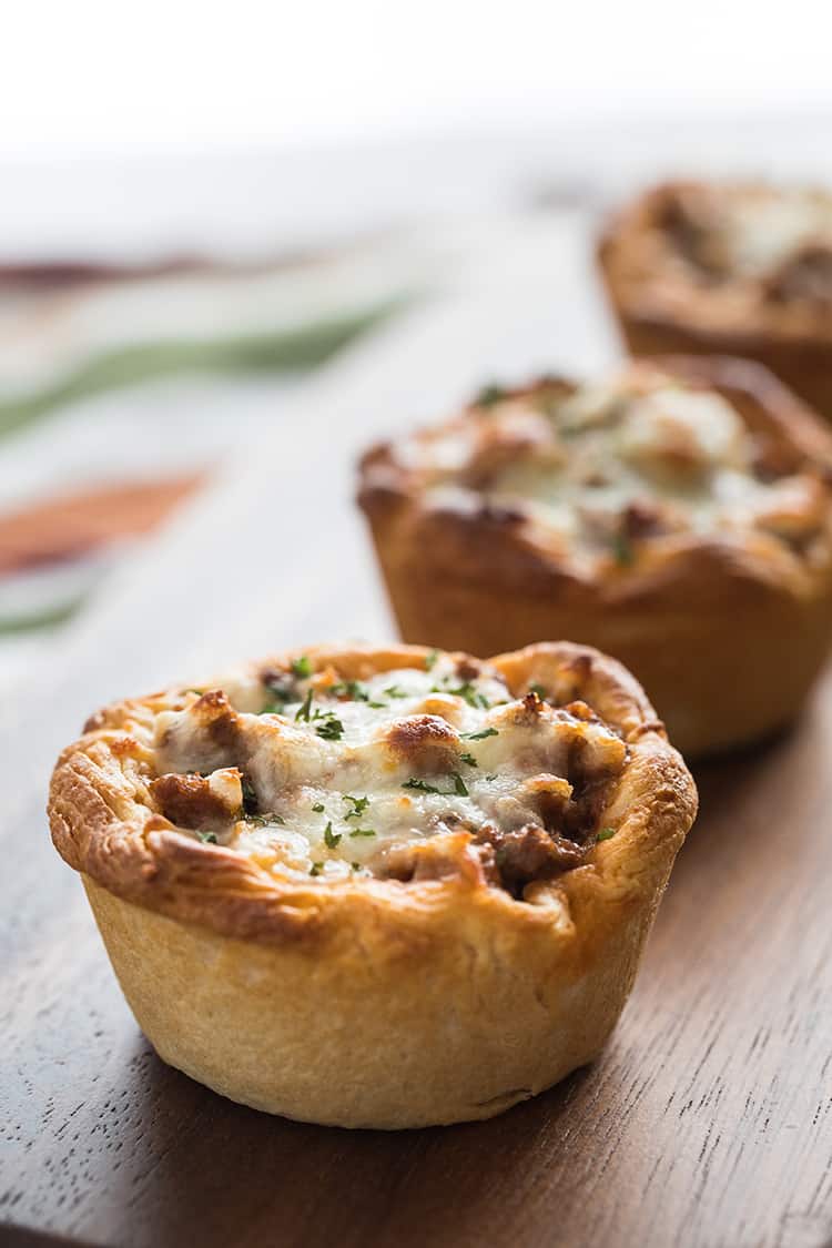 Savory Italian Biscuit Cups close-up, arranged on cutting board