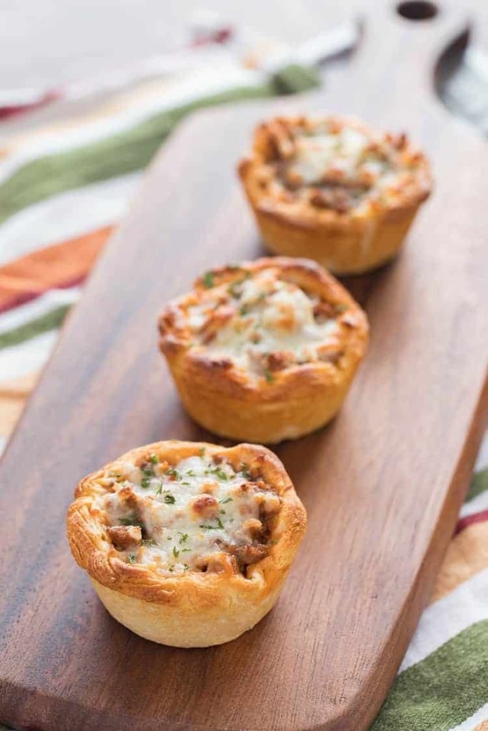 Savory Italian Biscuit Cups after final bake, arranged on cutting board