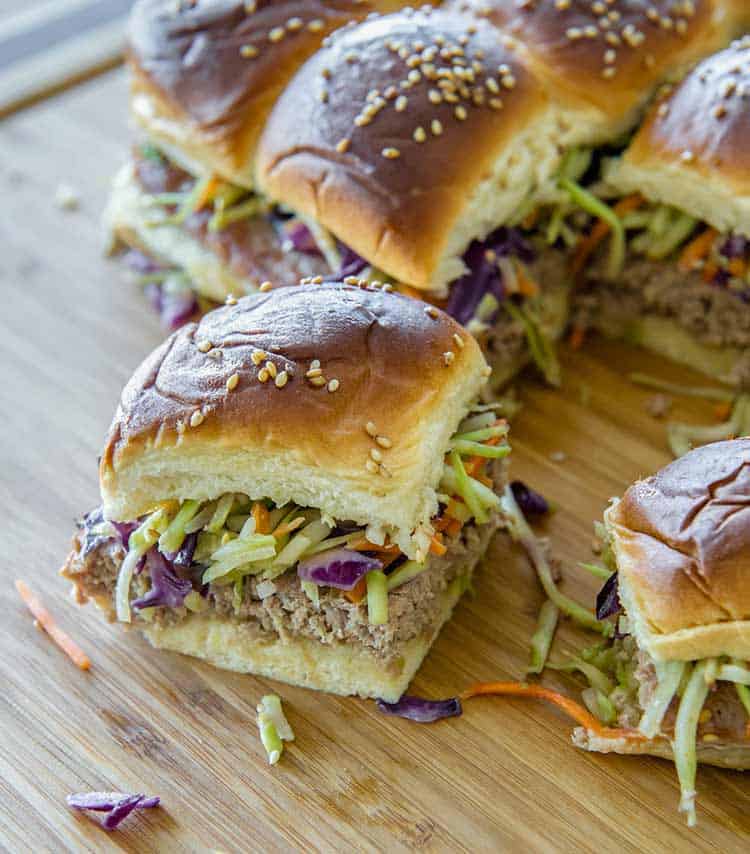 Teriyahi Sliders with broccoli slaw, on cutting board ready to eat