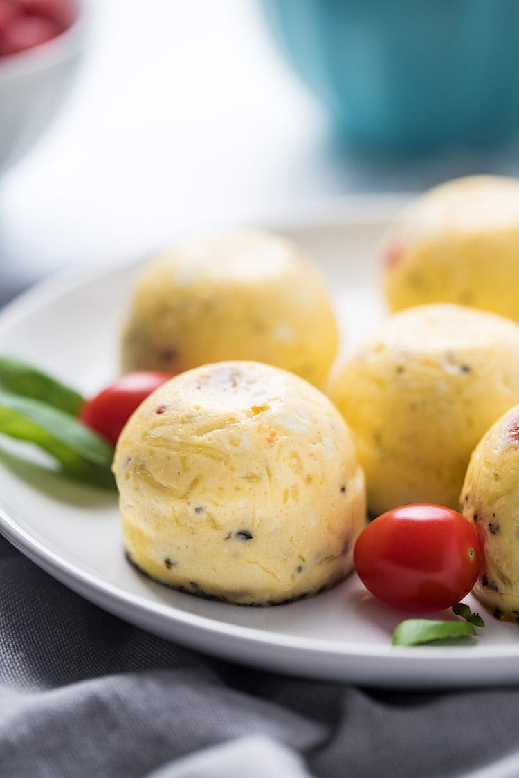 Close up shot of a Caprese Egg Bite on a plate