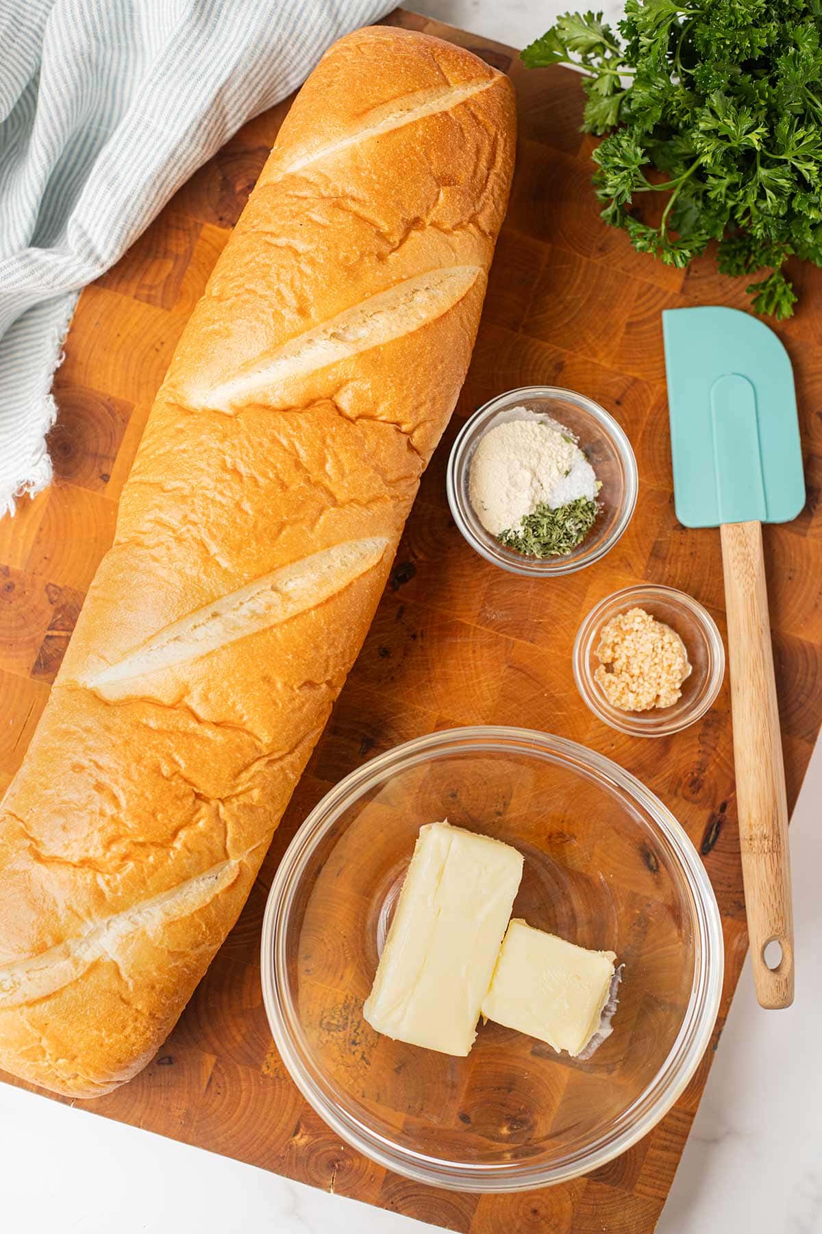 Overhead shot of ingredients needed for make-ahead freezer garlic bread.