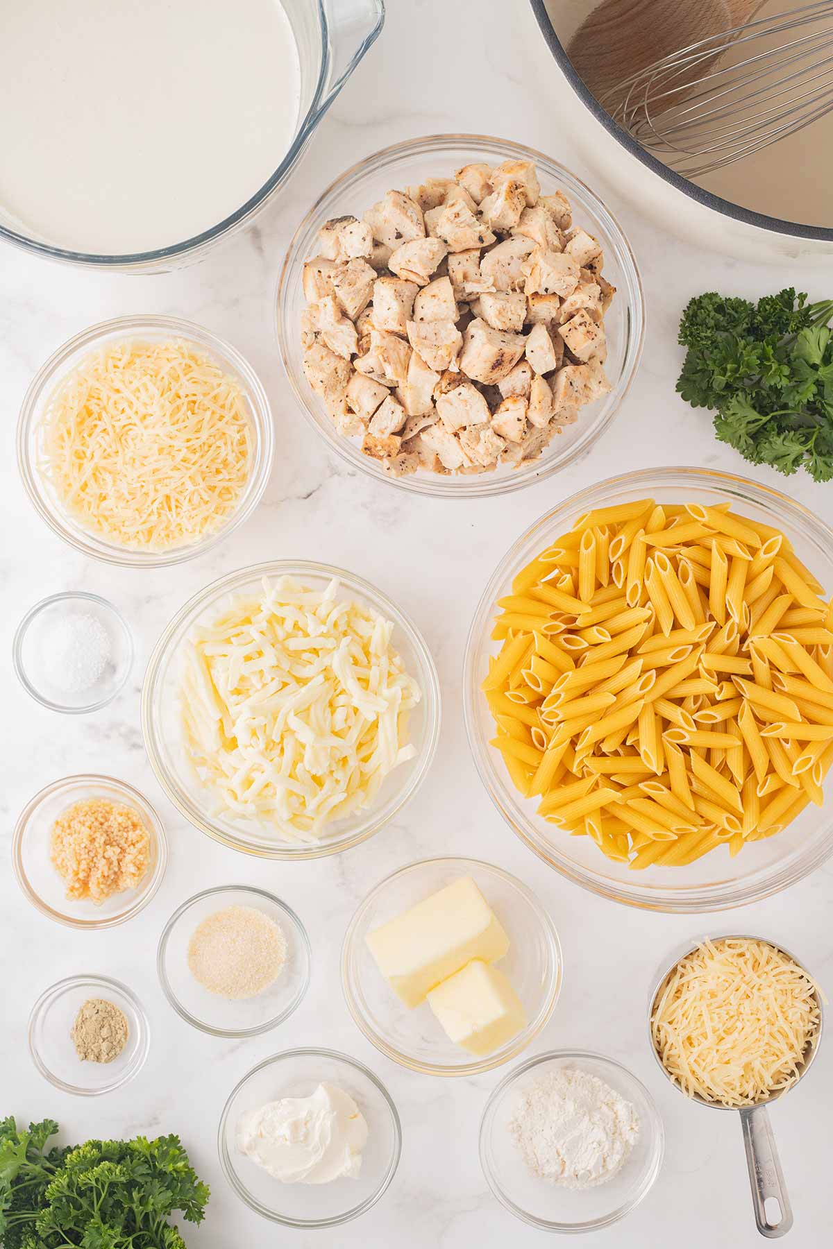 Overhead shot of ingredients needed to make Chicken Alfredo Bake.