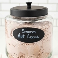 Closeup shot of S'mores Hot Chocolate Mix in a large storage jar.
