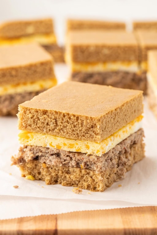 Front shot of a completed sheet pan McGriddle breakfast sandwich.