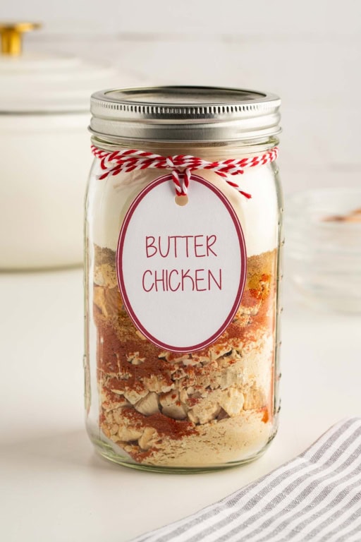Photo of Butter Chicken Meal in a Jar made up in a quart mason jar with a label tag.